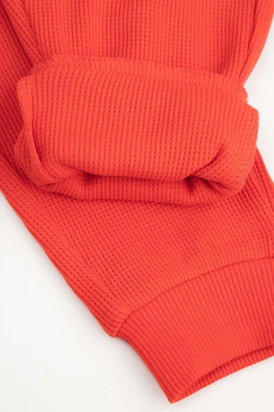 czerwony Coccodrillo spodnie dresowe niemowlęce