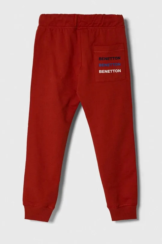 Дитячі бавовняні штани United Colors of Benetton червоний