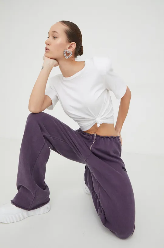 Бавовняні спортивні штани Rotate фіолетовий