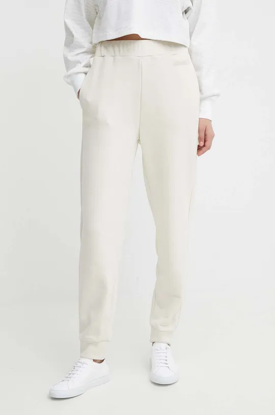 beżowy Calvin Klein spodnie dresowe Damski