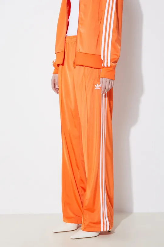 pomarańczowy adidas Originals spodnie dresowe