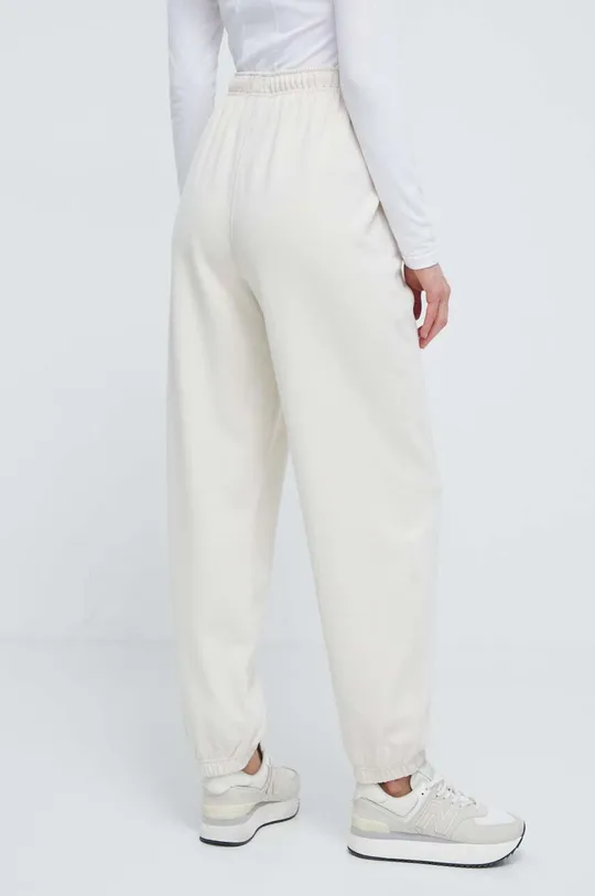New Balance spodnie dresowe bawełniane WP41513LIN 100 % Bawełna