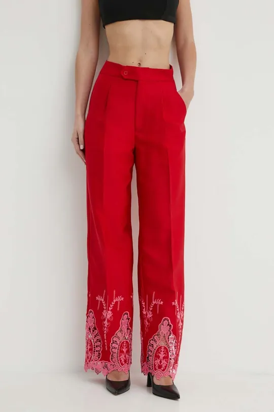 czerwony Never Fully Dressed spodnie Damski