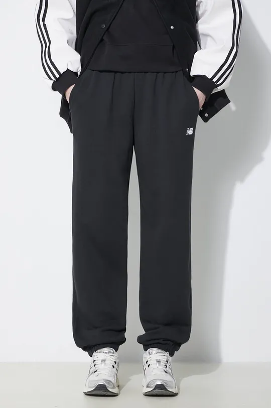 czarny New Balance spodnie dresowe Sport Essentials Damski