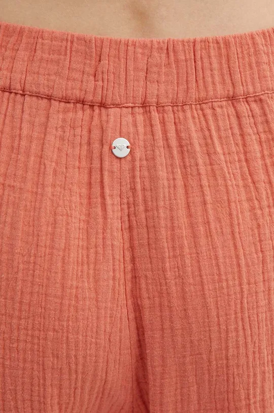 narančasta Pamučne hlače Roxy GOLDEN TROPICS