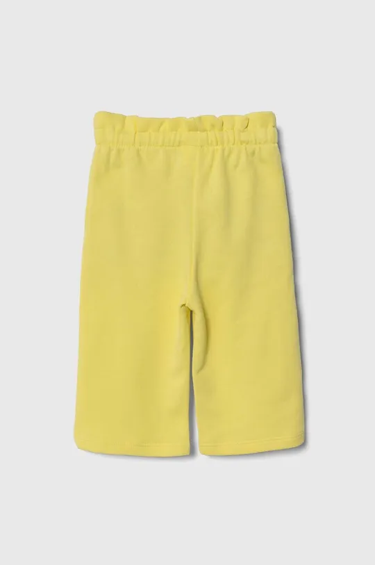 United Colors of Benetton spodnie dresowe bawełniane dziecięce żółty