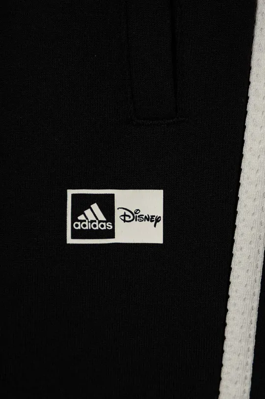 Tepláky adidas x Disney 67 % Bavlna, 33 % Recyklovaný polyester