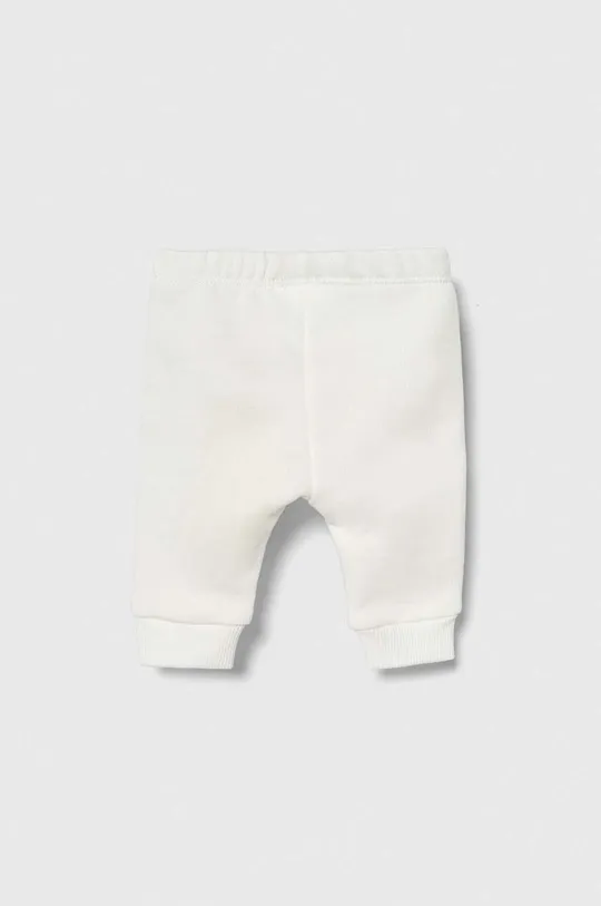 Бавовняні штани для немовлят United Colors of Benetton білий