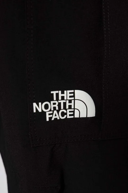 Dječji donji dio trenirke The North Face WOVEN CARGO PANT Temeljni materijal: 86% Poliester, 14% Elastan Podstava džepova: 100% Poliester