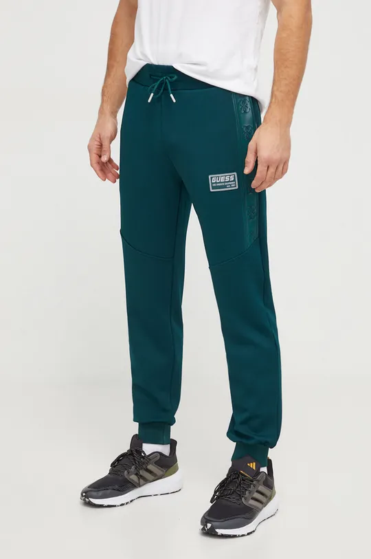 зелёный Спортивные штаны Guess Мужской