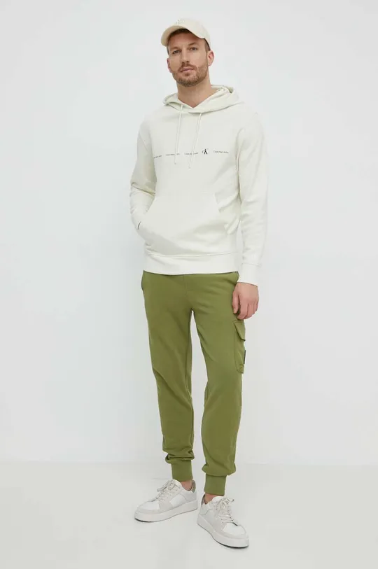 Βαμβακερό παντελόνι Calvin Klein Jeans πράσινο