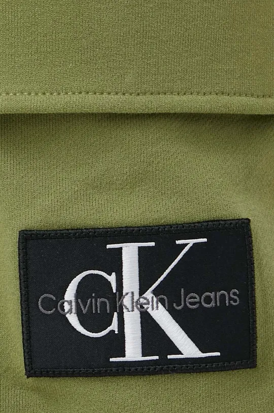 зелений Бавовняні спортивні штани Calvin Klein Jeans