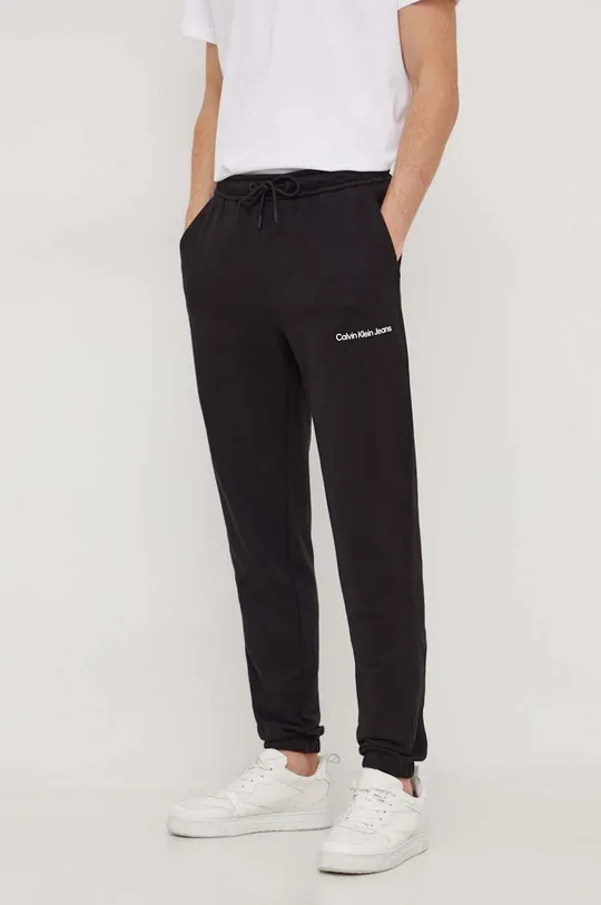 czarny Calvin Klein Jeans spodnie dresowe bawełniane Męski