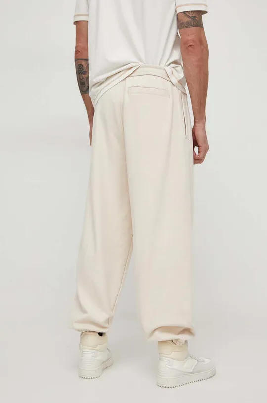 Бавовняні спортивні штани Calvin Klein Jeans Основний матеріал: 100% Бавовна Резинка: 97% Бавовна, 3% Еластан Стрічка: 88% Поліестер, 12% Еластан