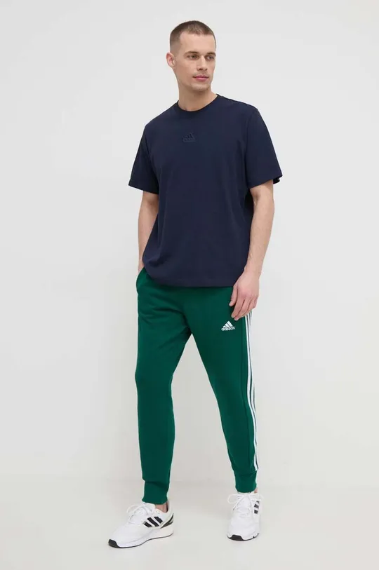 Хлопковые спортивные штаны adidas зелёный