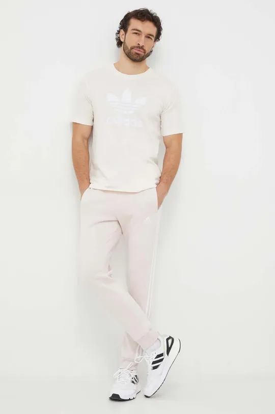adidas spodnie dresowe różowy