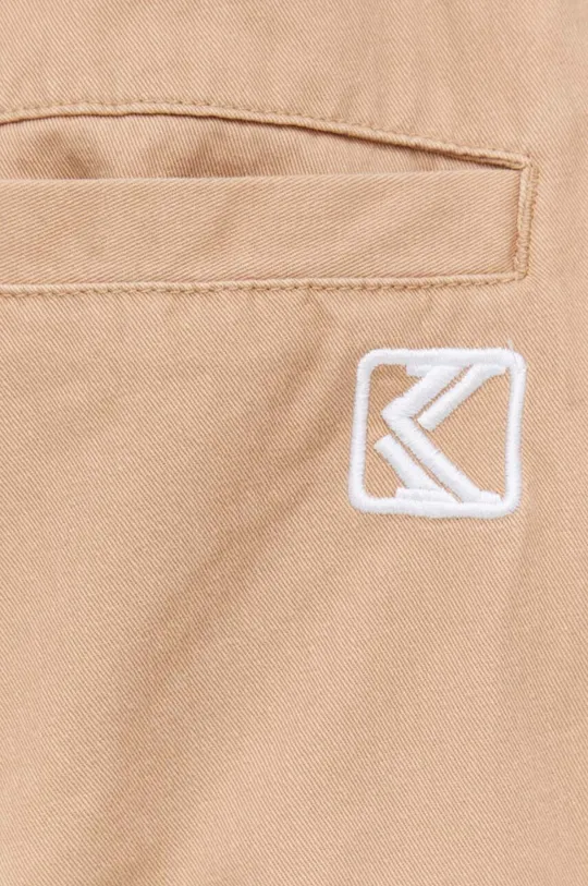 бежевый Хлопковые брюки Karl Kani