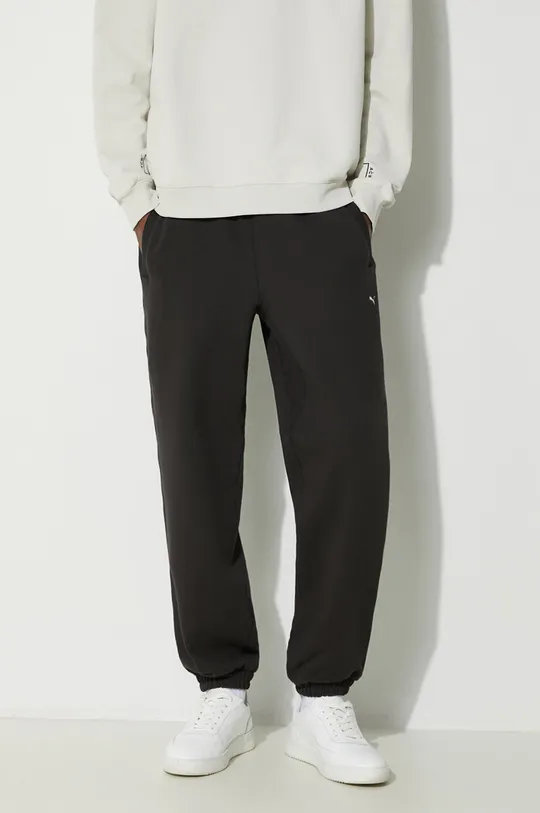 Бавовняні спортивні штани Puma MMQ Sweatpants Основний матеріал: 100% Бавовна Підкладка кишені: 100% Бавовна Резинка: 97% Бавовна, 3% Еластан