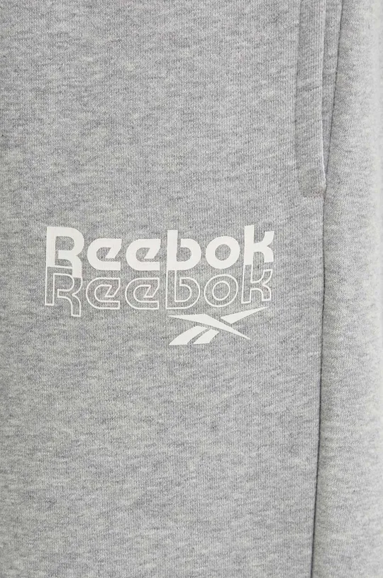 сірий Спортивні штани Reebok Brand Proud