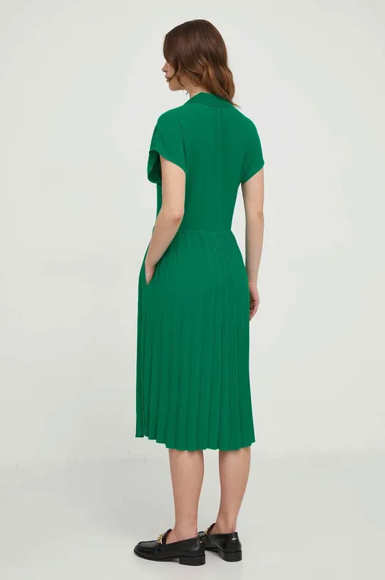 Платье Tommy Hilfiger Основной материал: 100% Полиэстер Резинка: 75% Полиэстер, 23% Полиамид, 2% Эластан