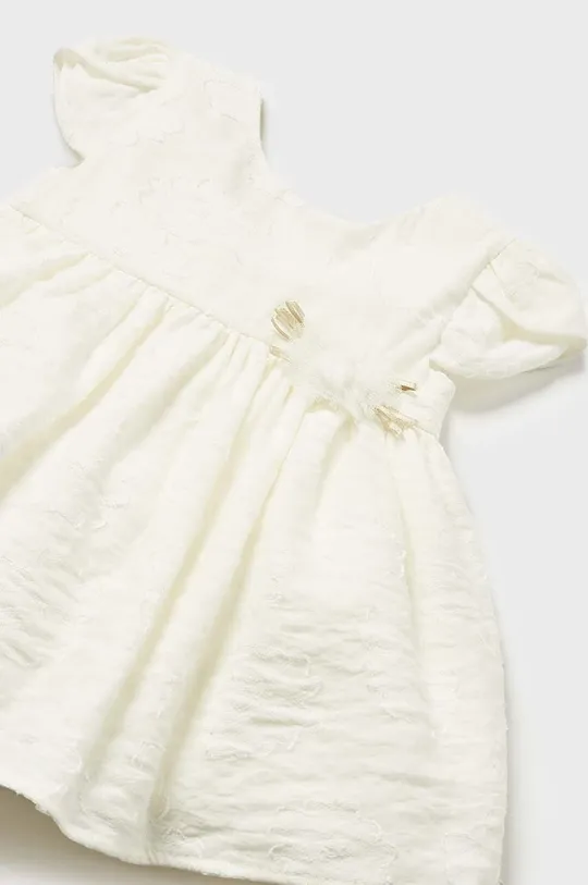Mayoral sukienka niemowlęca Materiał zasadniczy: 74 % Wiskoza, 26 % Poliamid, Podszewka: 85 % Bawełna, 15 % Poliamid
