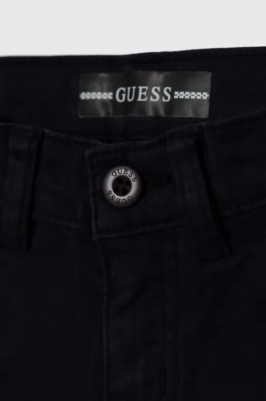 Otroške kratke hlače Guess Glavni material: 97 % Bombaž, 3 % Elastan Podloga žepa: 100 % Bombaž