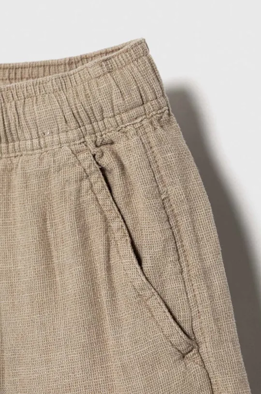 Otroške lanene kratke hlače Abercrombie & Fitch Glavni material: 55 % Lan, 45 % Viskoza Podloga žepa: 100 % Bombaž