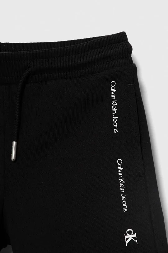 Dječje pamučne kratke hlače Calvin Klein Jeans Temeljni materijal: 100% Pamuk Manžeta: 97% Pamuk, 3% Poliester