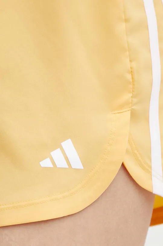 żółty adidas Performance szorty treningowe Pacer