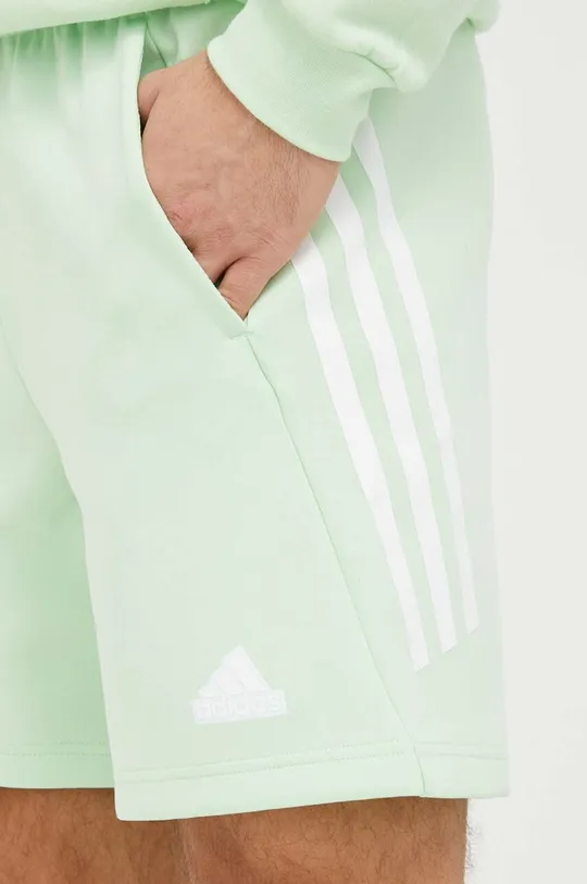 зелений Шорти adidas