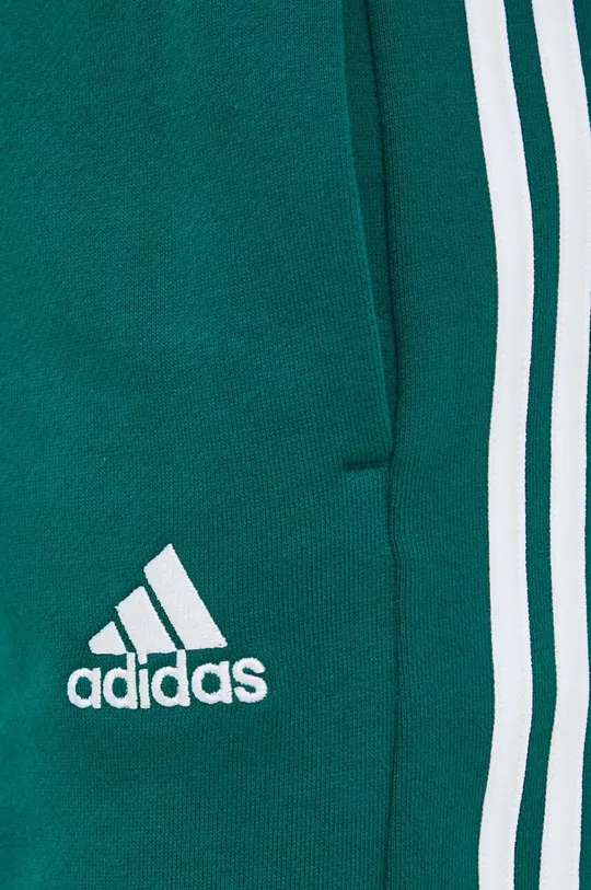 зелений Бавовняні шорти adidas