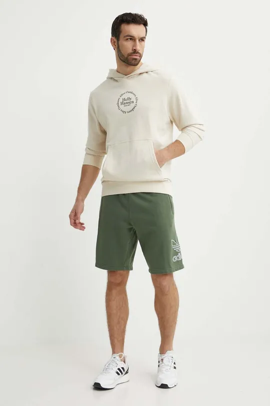 Бавовняні шорти adidas Originals зелений