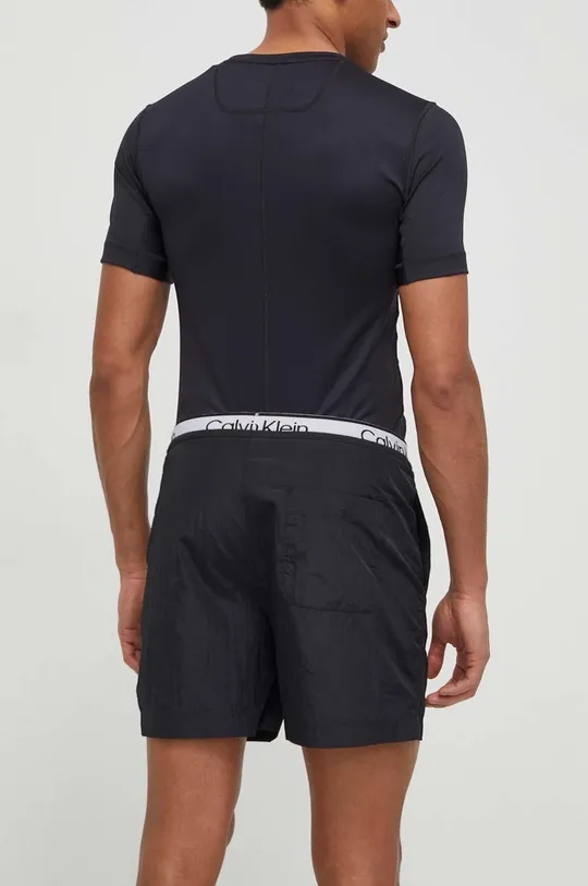 Kratke hlače za trening Calvin Klein Performance Temeljni materijal: 100% Najlon Podstava: 100% Poliester
