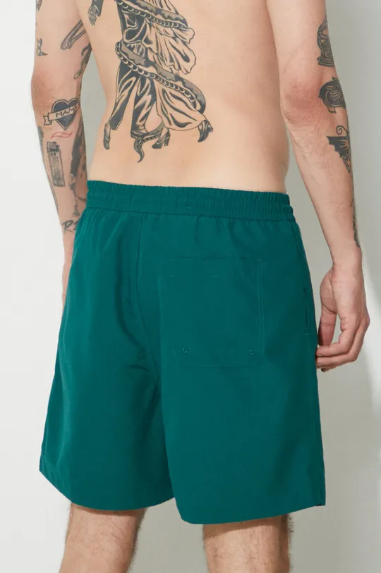 Bavlněné šortky Carhartt WIP Chase Swim Trunks zelená