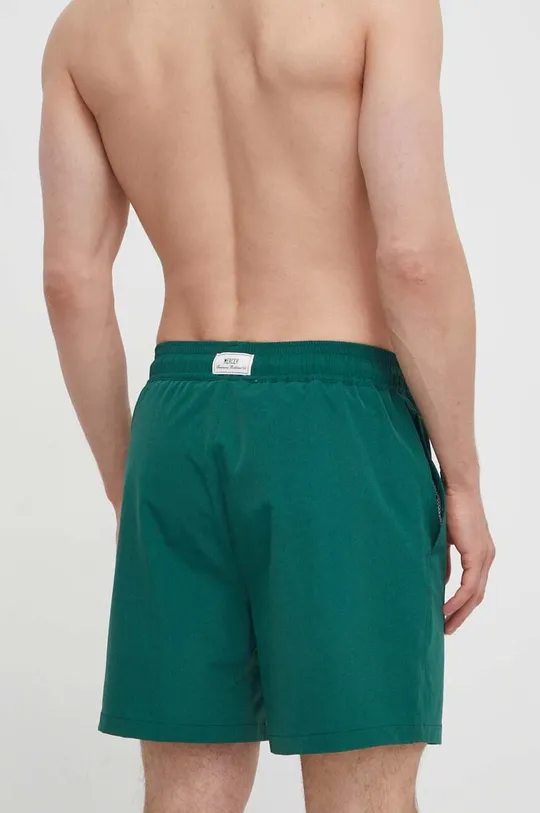 Kopalne kratke hlače Mercer Amsterdam Glavni material: 92 % Poliamid, 8 % Elastan Podloga: 100 % Poliester