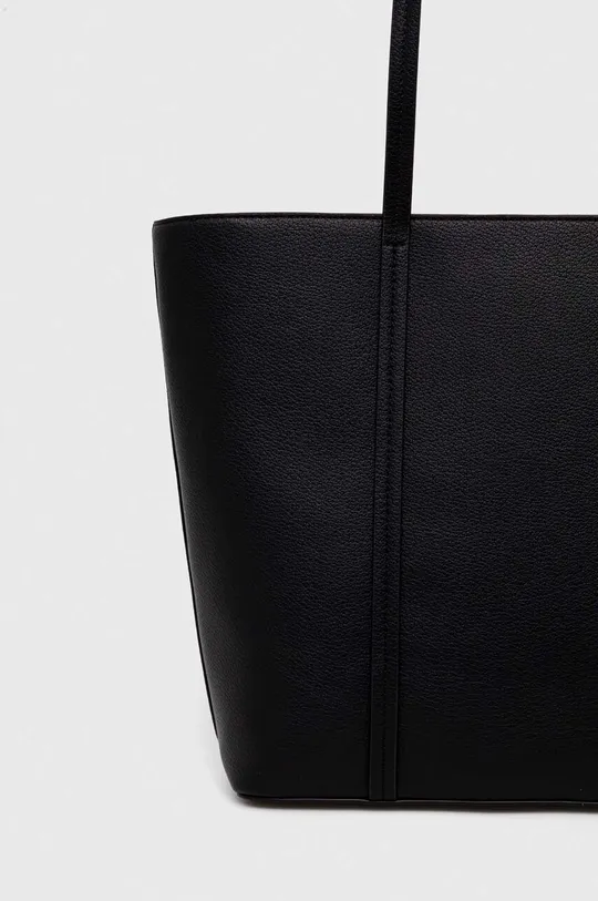 Шкіряна сумочка Dkny Основний матеріал: 100% Натуральна шкіра Підкладка: 100% Текстильний матеріал