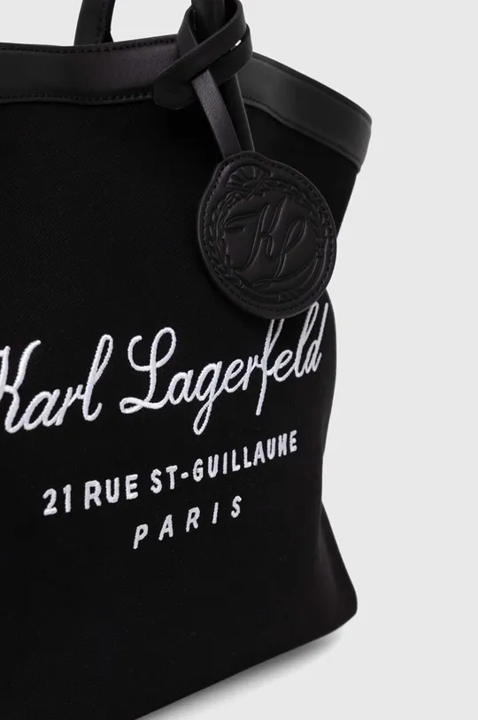 Torba Karl Lagerfeld Temeljni materijal: 85% Pamuk, 15% Poliuretan Podstava: 100% Reciklirani poliester