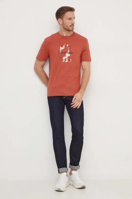 Bombažna kratka majica Calvin Klein oranžna