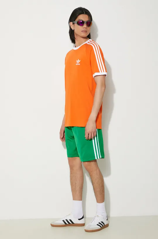 Хлопковая футболка adidas Originals оранжевый