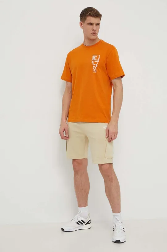 Βαμβακερό μπλουζάκι The North Face πορτοκαλί