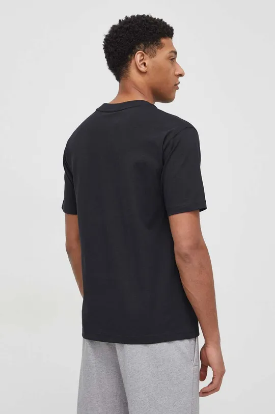 Bavlněné tričko New Balance MT41533BK Hlavní materiál: 100 % Bavlna Stahovák: 70 % Bavlna, 30 % Polyester