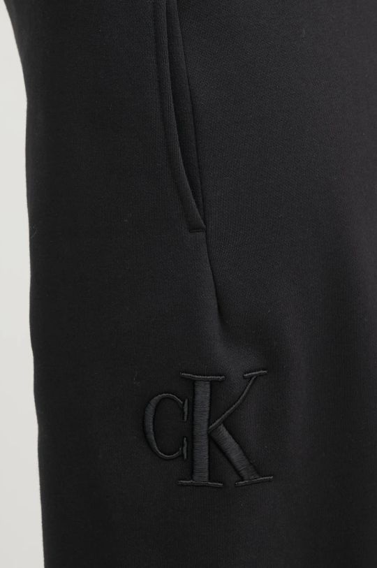 Tepláky Calvin Klein Jeans černá J20J224841