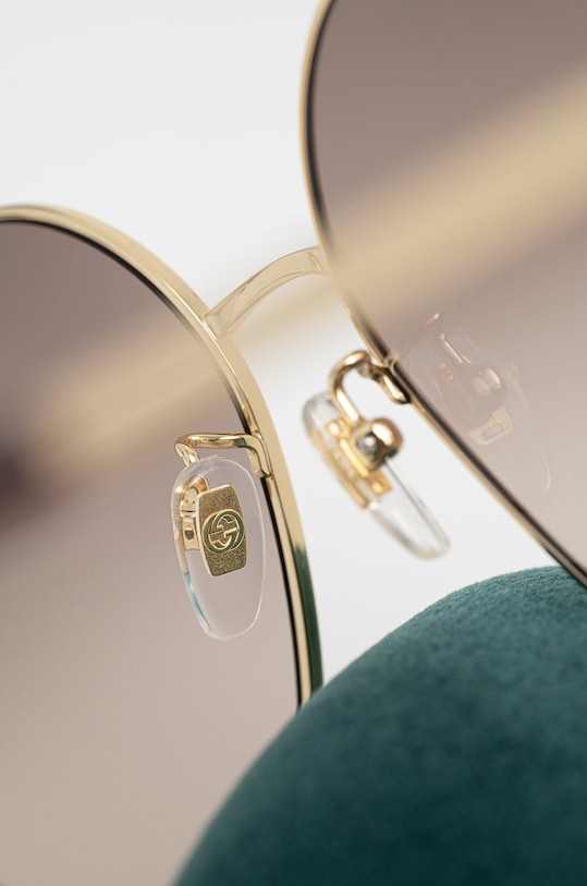 Gucci okulary przeciwsłoneczne złoty GG1089SA