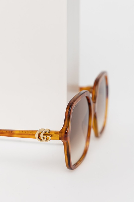 Slnečné okuliare Gucci hnedá GG1072S