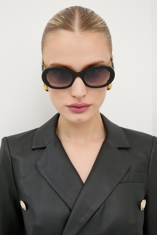 Солнцезащитные очки Chloé круглые коричневый CH0197S