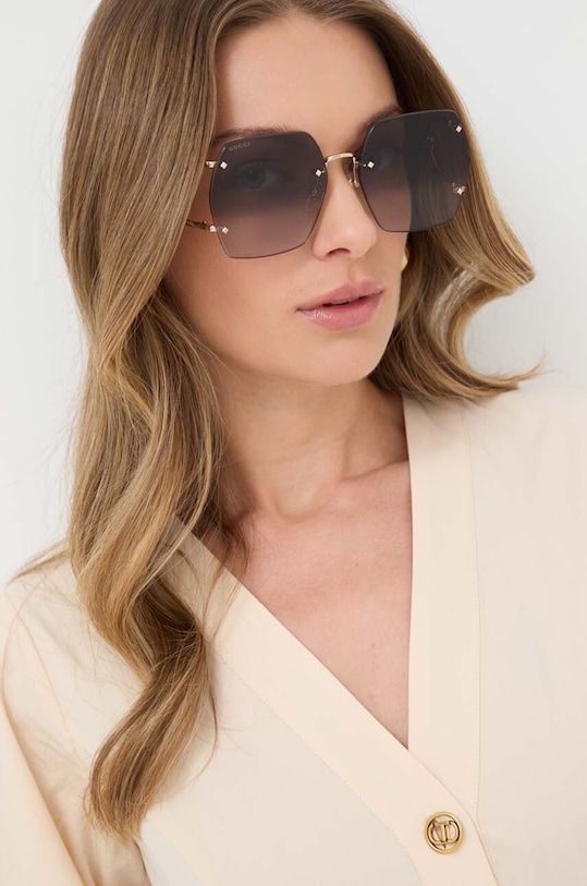 Gucci okulary przeciwsłoneczne gradientowa złoty GG1562S