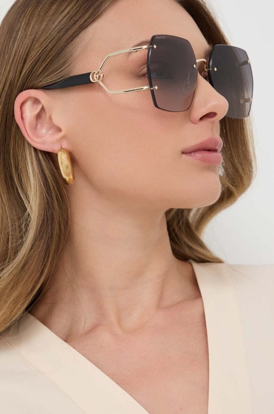 Gucci okulary przeciwsłoneczne GG1562S złoty