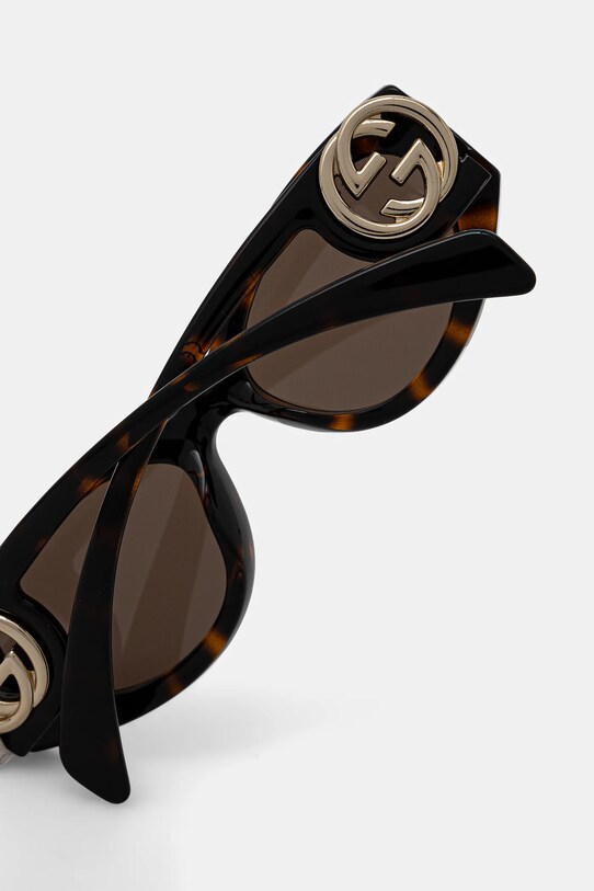 Солнцезащитные очки Gucci коричневый GG1691S