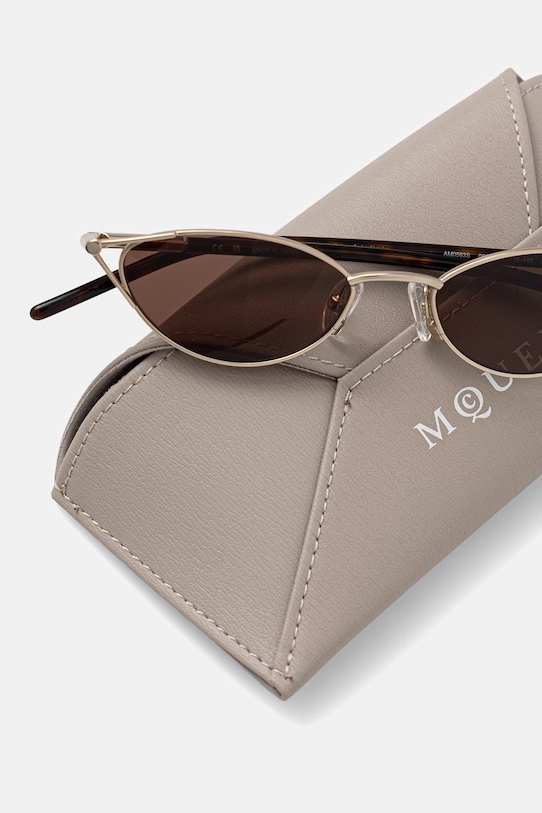 Akcesoria Alexander McQueen okulary przeciwsłoneczne kocie oczy damskie AM0563S złoty