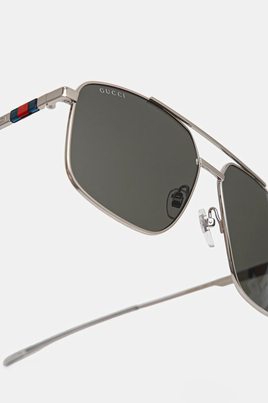 Солнцезащитные очки Gucci серебрянный GG1676S